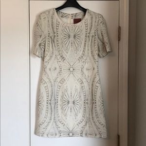 White mini dress or tunic.